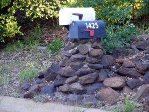 the mailbox fell over and all that was affordable was to pile up some rocks and stick the box on top