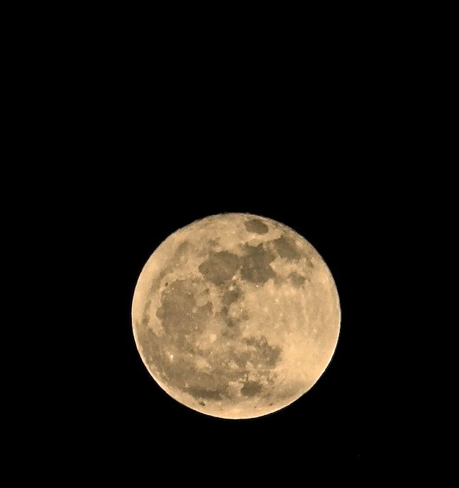 With the help of simple post-processing, one can get a warm glow to the full moon....