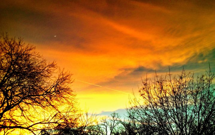 has the moon and a streaking jet across the sky...maybe I should sell my big cameras and use my iPhone more often (yeah right). :)