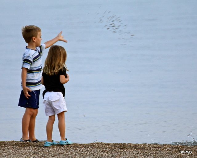 Two kids unknown to me was captured tossing pebbles into the great "beyond"...and it looks like there was a conversation to their purpose as well...