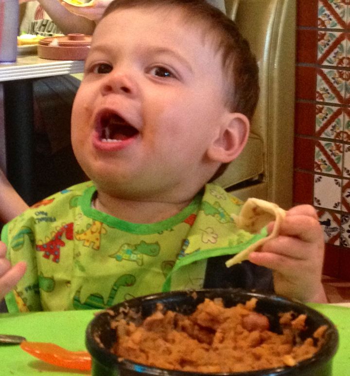 A tortilla and a bowl of beans and rice would bring a smile to anyone's face, right? Living life fully (at this age there are only two other things you gotta do) and experiencing the world through his perspective