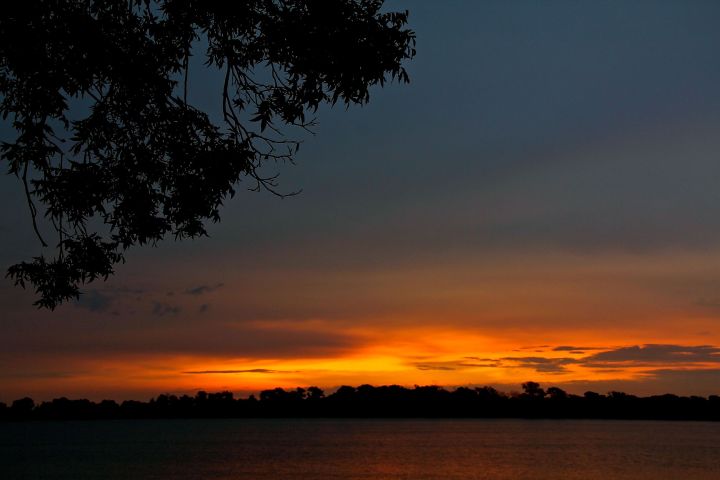 Looking and waiting for that right moment, I happened upon my friend Doyt with the same photo capture in mind. We found a picnic table, visited, talked cameras, and just let a filtered sunrise punctuate our conversation.