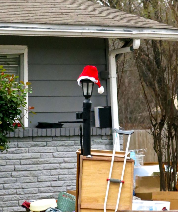 Now I'm worried - at a neighborhood yard sale is Santa Claus' cap and one crutch…somebody tell me it ain't so….