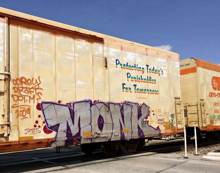 Every car had graffiti, some showcasing more artistic talent than others. We were wishful for another train on our walk back from lunch (but our timing was not as fortunate as before)….