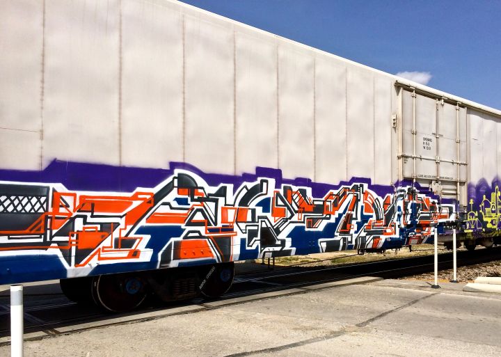 Just think what this artist could do if he wore those drywaller stilts in painting higher than than reach….