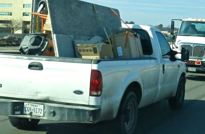 And then I notice - believe me when I say "I notice" - the car tag of one vehicle...