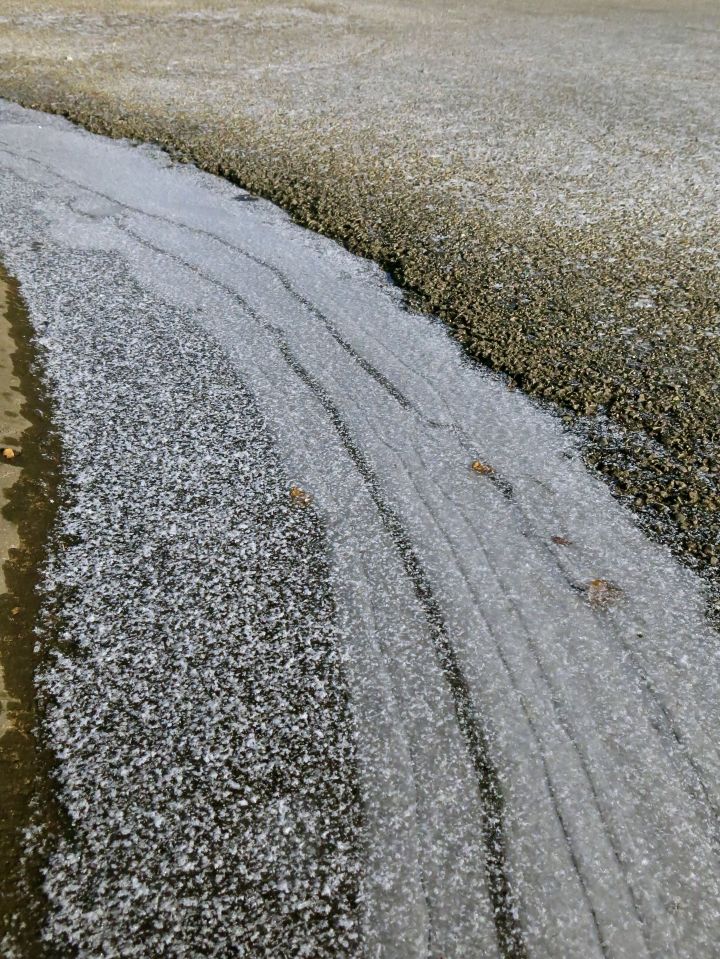 Hopefully, the last cold, messy weather of the year is being dealt with today. I morning walk found yet another river of frozen gutter water...