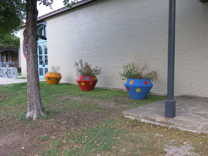 Artful pots without a sense of coordinating colors….