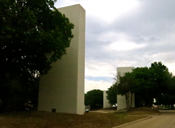 Is it me or do these towers make no sense standing in the roadway median without what seems to be a purpose?